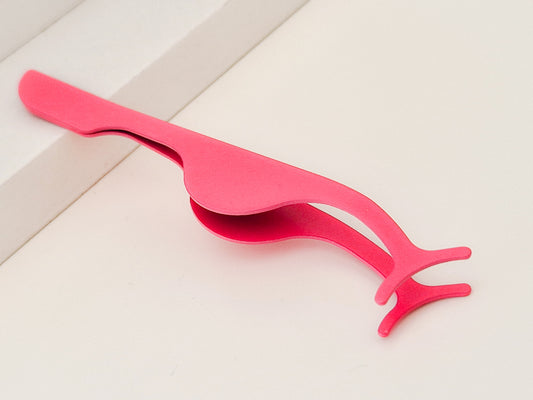 Eyelash curler/tweezer