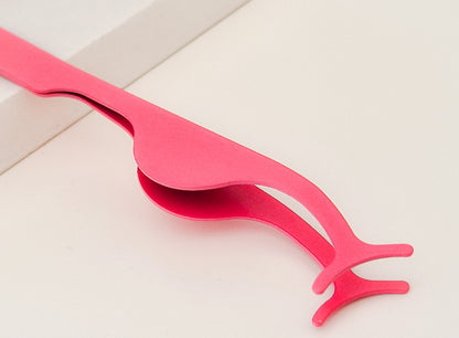 Eyelash curler/tweezer