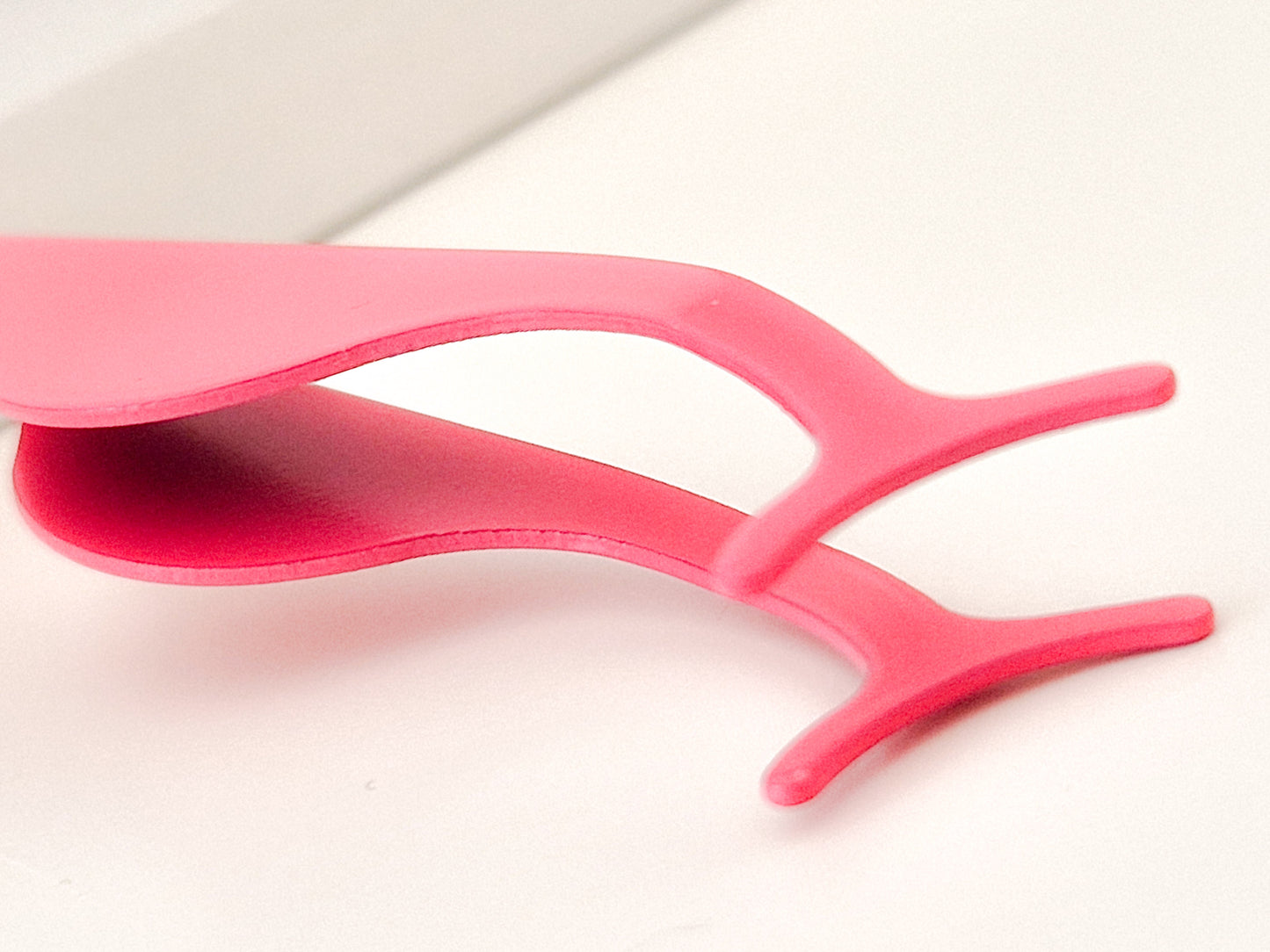 Eyelash curler/tweezer